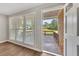 Bright living room with hardwood floors and view of deck at 4761 Lincoln Ne Dr, Kennesaw, GA 30144