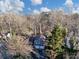 Aerial view showcasing the property's location among lush greenery, featuring a two-car garage at 2545 Kingswood Dr, Marietta, GA 30066