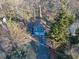 Aerial view showcasing the property's location among lush greenery, featuring a two-car garage at 2545 Kingswood Dr, Marietta, GA 30066