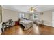 Comfortable bedroom with hardwood floors and sitting area at 2545 Kingswood Dr, Marietta, GA 30066