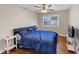 Bright bedroom with hardwood floors and a ceiling fan at 2545 Kingswood Dr, Marietta, GA 30066