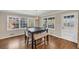 Bright dining room with hardwood floors and a charming table set at 2545 Kingswood Dr, Marietta, GA 30066