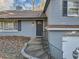 Brick and gray house entry with a curved staircase at 2545 Kingswood Dr, Marietta, GA 30066