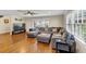 Spacious living room featuring hardwood floors and a large sectional sofa at 2545 Kingswood Dr, Marietta, GA 30066