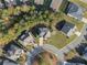 Aerial view of houses nestled in a wooded area at 308 Evening Rain Crst, Canton, GA 30114