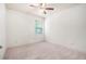 Simple bedroom with window and ceiling fan at 308 Evening Rain Crst, Canton, GA 30114