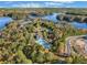 Aerial view of community amenities including pool and lake at 308 Evening Rain Crst, Canton, GA 30114