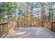 Wooden deck overlooking a wooded backyard at 308 Evening Rain Crst, Canton, GA 30114