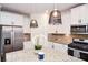 Modern kitchen with stainless steel appliances and granite countertops at 308 Evening Rain Crst, Canton, GA 30114