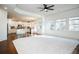 Open concept kitchen with island and white cabinets at 308 Evening Rain Crst, Canton, GA 30114