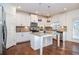 Modern kitchen with white cabinets, granite counters, and stainless steel appliances at 308 Evening Rain Crst, Canton, GA 30114