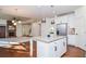 Modern kitchen with white cabinets, granite counters, and stainless steel appliances at 308 Evening Rain Crst, Canton, GA 30114