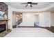 Bright living room featuring hardwood floors and a fireplace at 308 Evening Rain Crst, Canton, GA 30114