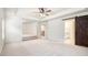 Main bedroom with a barn door and view to the loft at 308 Evening Rain Crst, Canton, GA 30114