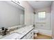 Bathroom features granite countertop and bathtub at 557 Summit Sw Ln, Marietta, GA 30008