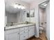 Double vanity bathroom with granite countertop at 557 Summit Sw Ln, Marietta, GA 30008