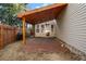 Brick patio with wooden pergola and grill at 2600 Laurel Nw Ln, Kennesaw, GA 30152