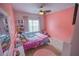 Cozy bedroom with light pink walls and unicorn theme at 430 St Annes Pl, Covington, GA 30016