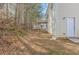 Home exterior showing a deck and a wooded backyard at 4506 Swan Trce, Atlanta, GA 30349