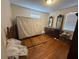 Bedroom with hardwood floors and wood furniture at 1964 E Lakeside Dr, Decatur, GA 30032