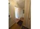 Light-filled hallway with wood floors and access to other rooms at 1964 E Lakeside Dr, Decatur, GA 30032