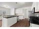 Modern kitchen with stainless steel appliances and granite countertops at 221 Cutbank Sw Ct, Atlanta, GA 30331