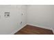 Laundry room with wood-look flooring at 221 Cutbank Sw Ct, Atlanta, GA 30331