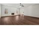 Spacious living room with hardwood floors and fireplace at 221 Cutbank Sw Ct, Atlanta, GA 30331