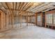 Large unfinished basement with high ceilings at 3690 Millwater Xing, Dacula, GA 30019