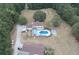 Aerial view of house, pool, and surrounding area at 4335 Commodore Rd, Powder Springs, GA 30127