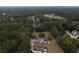 Wide aerial view of property and surroundings at 4335 Commodore Rd, Powder Springs, GA 30127