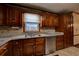 Modern kitchen with granite countertops and stainless steel dishwasher at 4335 Commodore Rd, Powder Springs, GA 30127