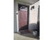 Exterior burgundy front door with a welcome mat at 1625 Conley Rd # 138, Conley, GA 30288