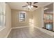 Versatile bonus room with tile floors and ceiling fan at 1927 Vicki Se Ln, Atlanta, GA 30316