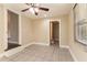 Bonus room with tile floor, ceiling fan, and access to a closet at 1927 Vicki Se Ln, Atlanta, GA 30316