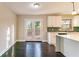 Bright dining area with French doors leading to a deck at 1927 Vicki Se Ln, Atlanta, GA 30316