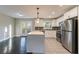 Modern kitchen with white cabinets, stainless steel appliances, and an island at 1927 Vicki Se Ln, Atlanta, GA 30316