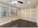 Living room with dark hardwood floors and wainscoting at 1927 Vicki Se Ln, Atlanta, GA 30316