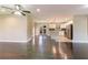 Open concept living room with dark hardwood floors and a view of the kitchen at 1927 Vicki Se Ln, Atlanta, GA 30316