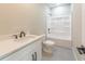 Clean bathroom with white vanity, bathtub, and shower at 4392 Navajo Se Ln, Acworth, GA 30102