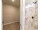 Small room with carpet and adjacent shower at 4392 Navajo Se Ln, Acworth, GA 30102