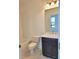 Clean bathroom with white subway tile and dark vanity at 4802 Larkin Pass, Buford, GA 30518