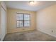 Spacious bedroom with double door closet and large window at 2216 Mcdaniel Mill Sw Rd, Conyers, GA 30094