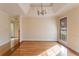 Sunlit dining room featuring hardwood floors and high ceilings at 2216 Mcdaniel Mill Sw Rd, Conyers, GA 30094