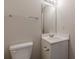 Simple bathroom with toilet and vanity at 320 Goldenrod Dr, Stockbridge, GA 30281