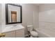 Bathroom features a tub shower combo, toilet and vanity at 320 Goldenrod Dr, Stockbridge, GA 30281