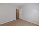 Spacious bedroom with neutral walls and carpet at 320 Goldenrod Dr, Stockbridge, GA 30281