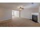 Living room featuring a fireplace and neutral decor at 320 Goldenrod Dr, Stockbridge, GA 30281