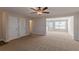 Open living space with access to dining area and kitchen at 320 Goldenrod Dr, Stockbridge, GA 30281