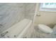 Updated bathroom with a new bathtub and toilet at 3488 Brookfield Ln, Decatur, GA 30032